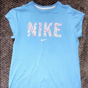 Blue Nike athletic shirt